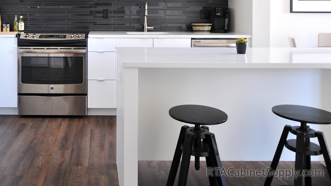 Ultra White kitchen an island view.
