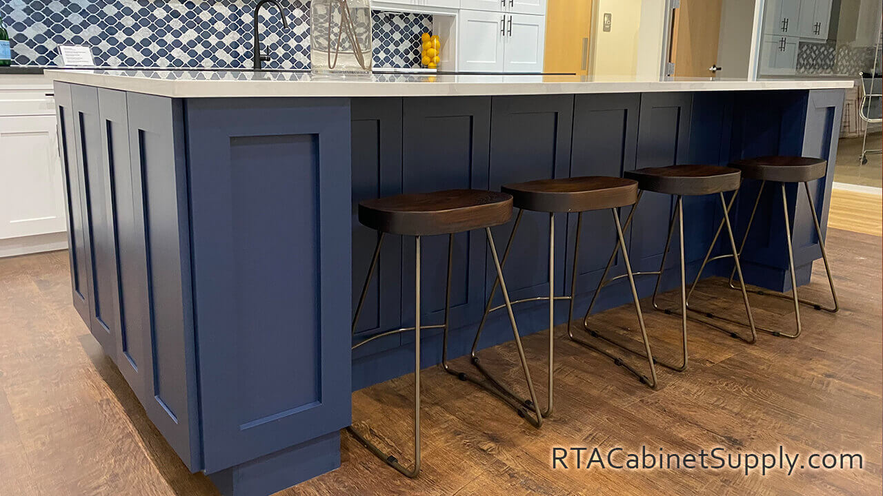 Madison Blue Shaker kitchen close up view with an island and chairs.
