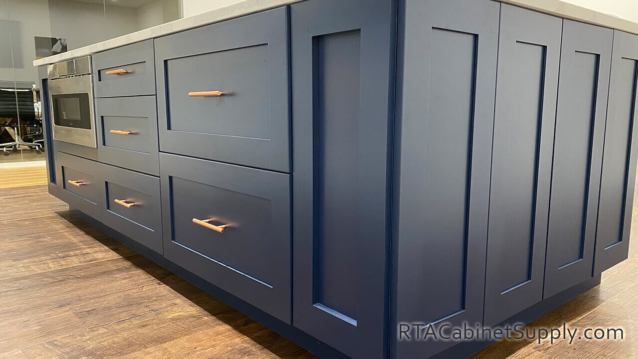 Madison Blue Shaker kitchen close up angle view with an island and base cabinets.