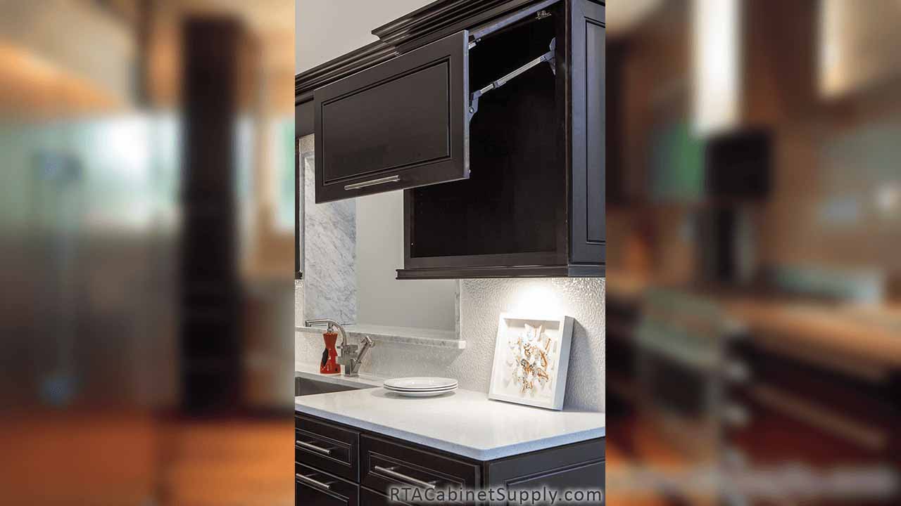 Modern Espresso kitchen close up angle view with an open wall cabinet.