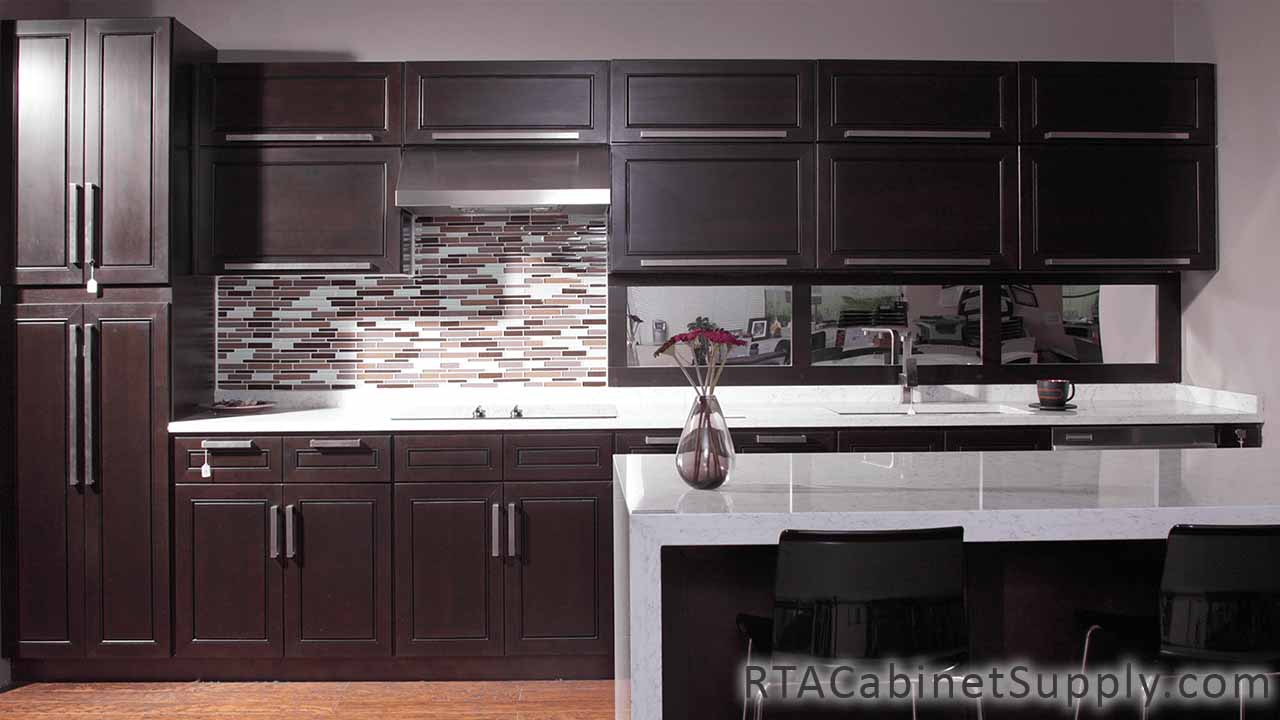 Modern Espresso kitchen full view with an island, a countertop, a pantry, wall and base cabinets.