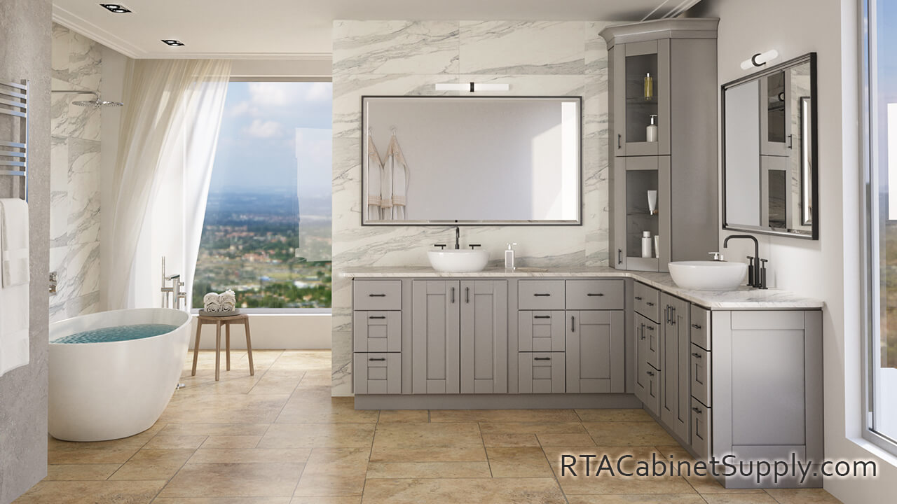 Anchester Grey bathroom full view with base cabinets, glass door cabinets and a mirror.