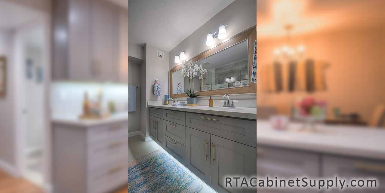 Classic Grey Shaker bathroom close up angle view with a mirror and base cabinets.
