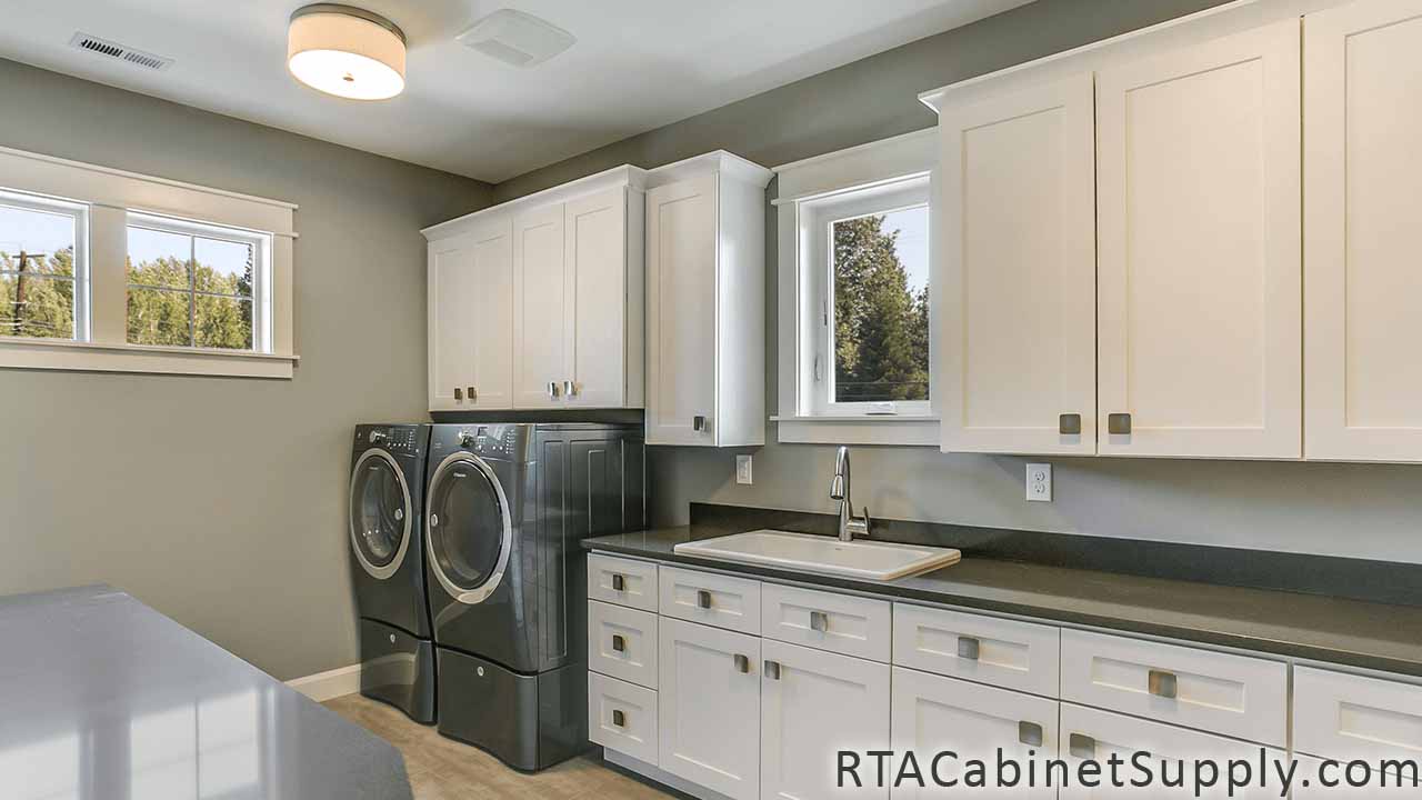 Classic White Shaker bathroom angle view with wall and base cabinets.