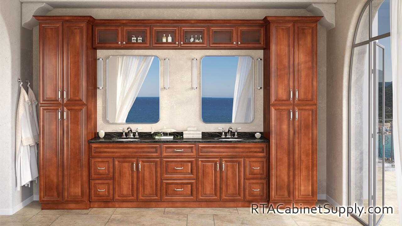 Coffee Cherry bathroom full view with two mirrors, pantry cabinets, wall and base cabinets.