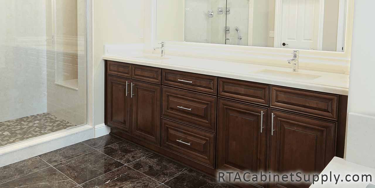 Jackson Chocolate bathroom angle view with a mirror, two sinks and base cabinets.