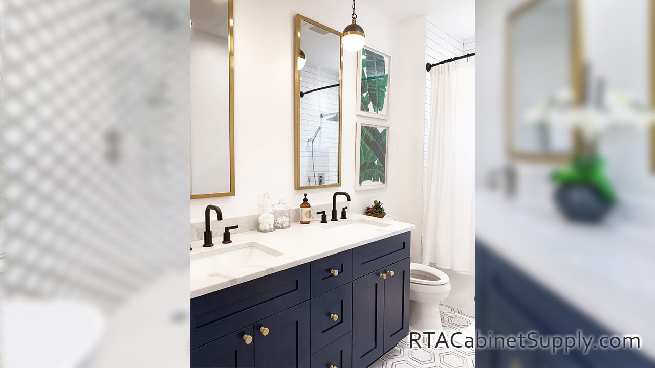 Madison Blue Shaker bathroom close up angle view with lighting, two mirrors, two sinks and base cabinets.