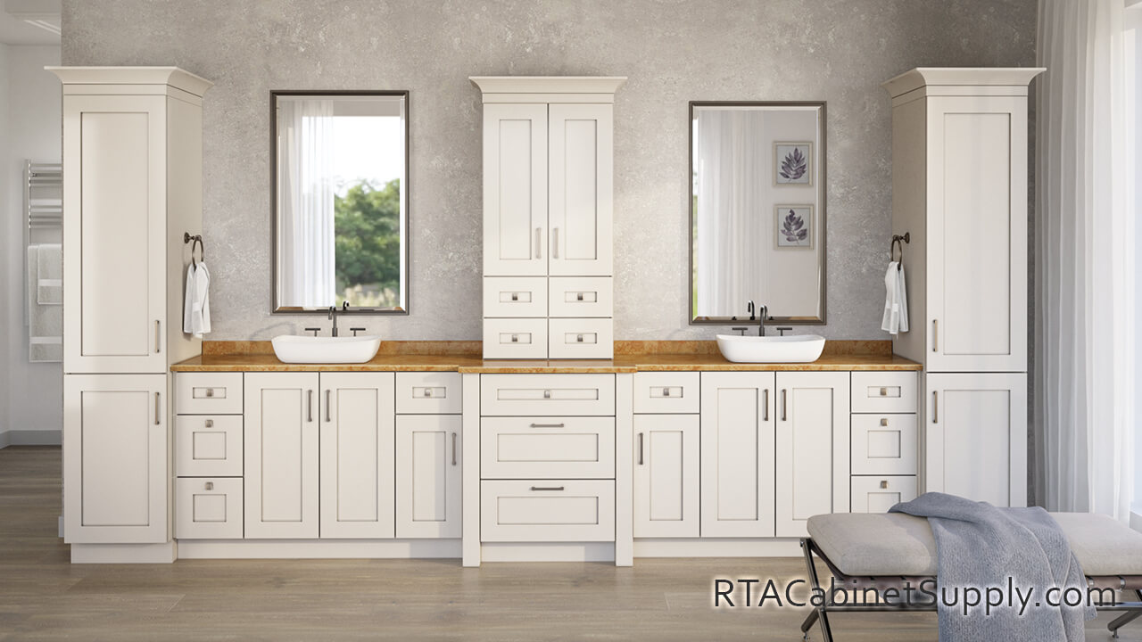 Madison Pearl Shaker bathroom full view with two mirrors, two sinks, pantry cabinets, wall and base cabinets.