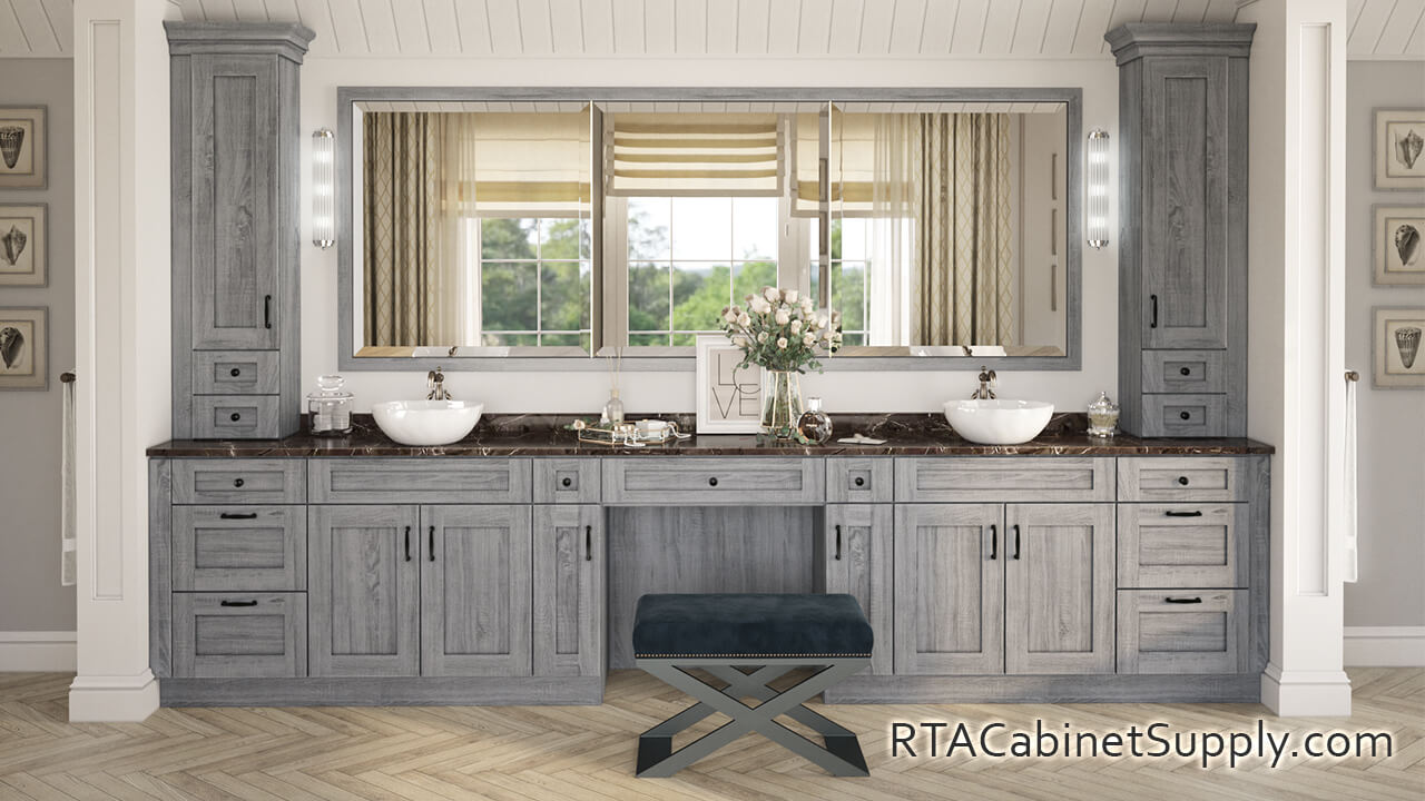 Newport Grey Shaker bathroom full view with two sinks, a mirror and base cabinets.