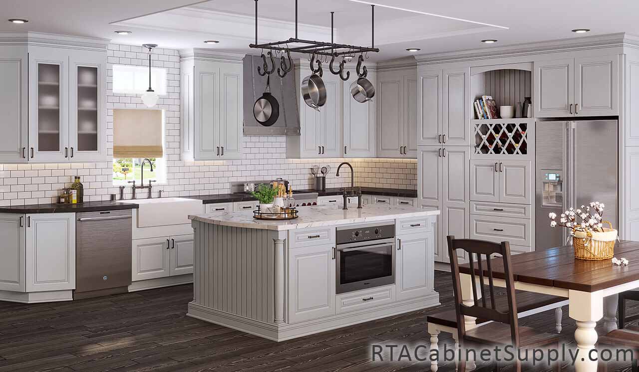 Newtown Dove kitchen full angle view with a wine rack cabinet, an island, a countertop, a glass door cabinets, pantry cabinets, wall and base cabinets.