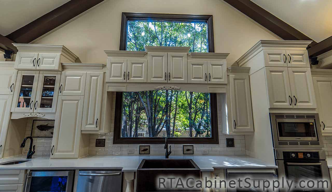 Oxfrord Cream kitchen full view with a countertop, and wall cabinets.