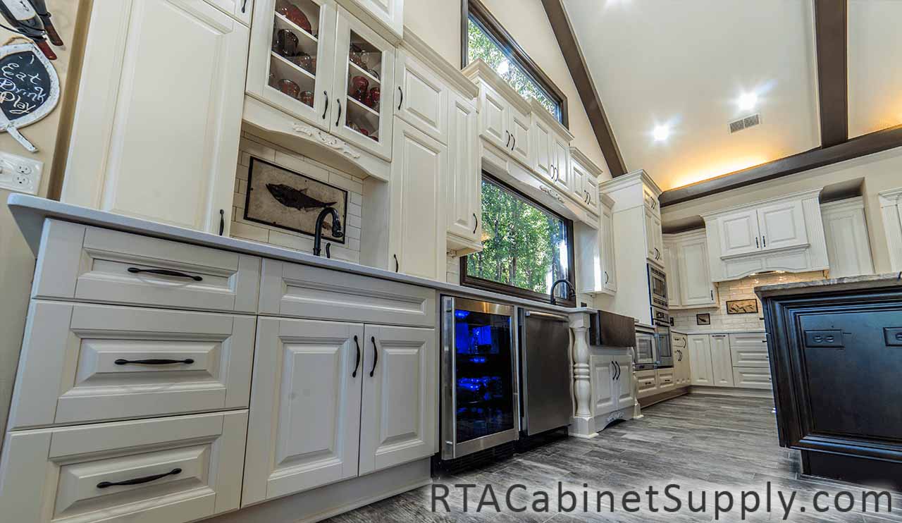 Oxfrord Cream kitchen close up view with lighting, wall and base cabinets.
