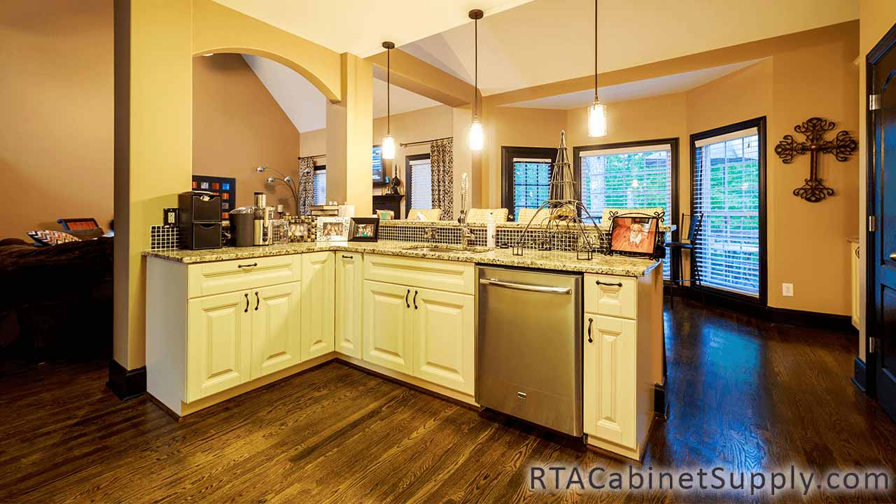 Oxfrord Cream kitchen full angle view with a countertop, and base cabinets.