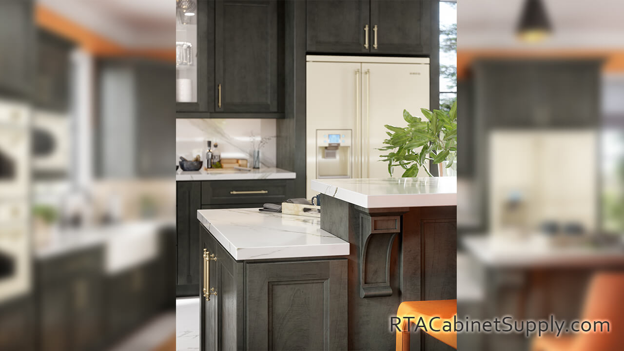 Preston Dark kitchen close up angle view with an island, a fridge, wall and base cabinets.