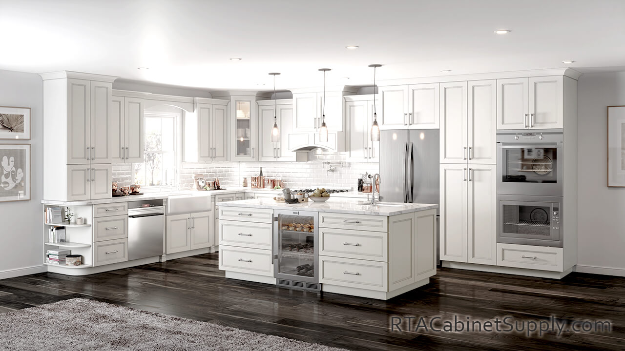 Preston White kitchen full angle view with an island, a countertop, a fridge, lighting, a range hood cover, wall and base cabinets.