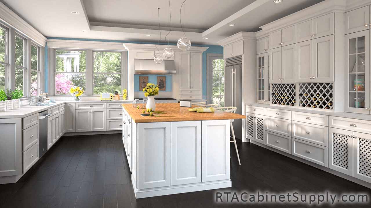 Bristol White kitchen full view with an island,  wine rack cabinets, wall and base cabinets, lighting and glass door cabinets.