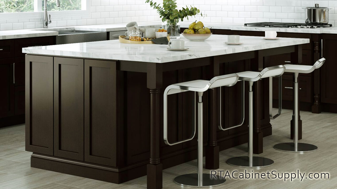 Camden Espresso Shaker kitchen close up view with an island and chairs.
