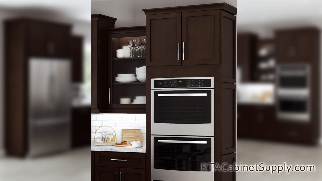 Camden Espresso Shaker kitchen close up view with wall cabinets, a glassdoor cabinet and an oven.