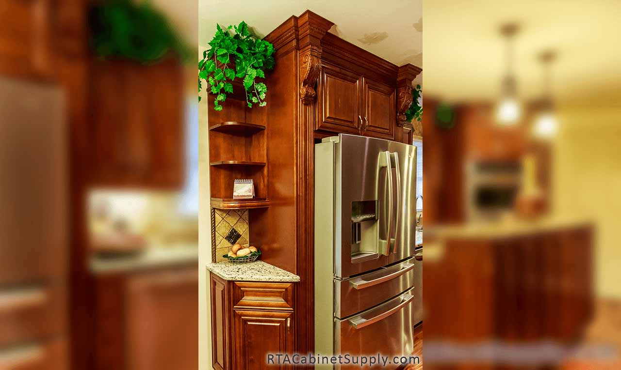 Coffee Cherry kitchen angle view with a wall and shelf cabinet, base cabinets and a fridge.