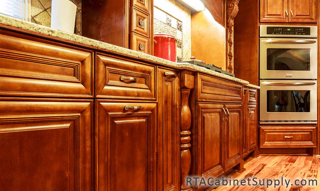 Coffee Cherry kitchen close up view with base cabinets and a countertop.