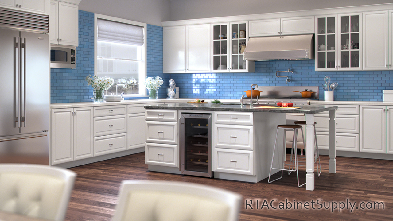 Concord Brilliant White kitchen full view with glass door wall cabinets, an island, a fridge, wall and base cabinets.