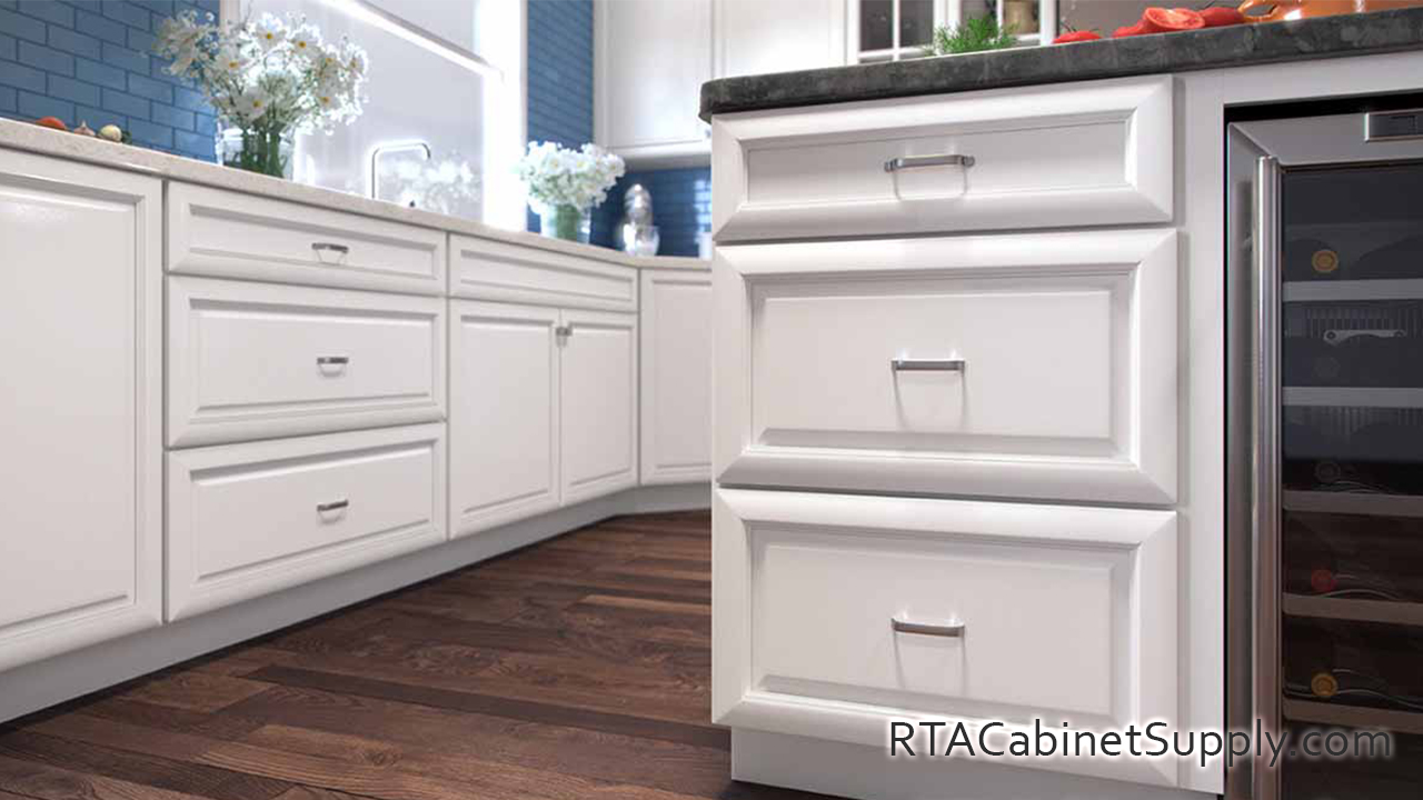 Concord Brilliant White kitchen close up view with base cabinets and an island.
