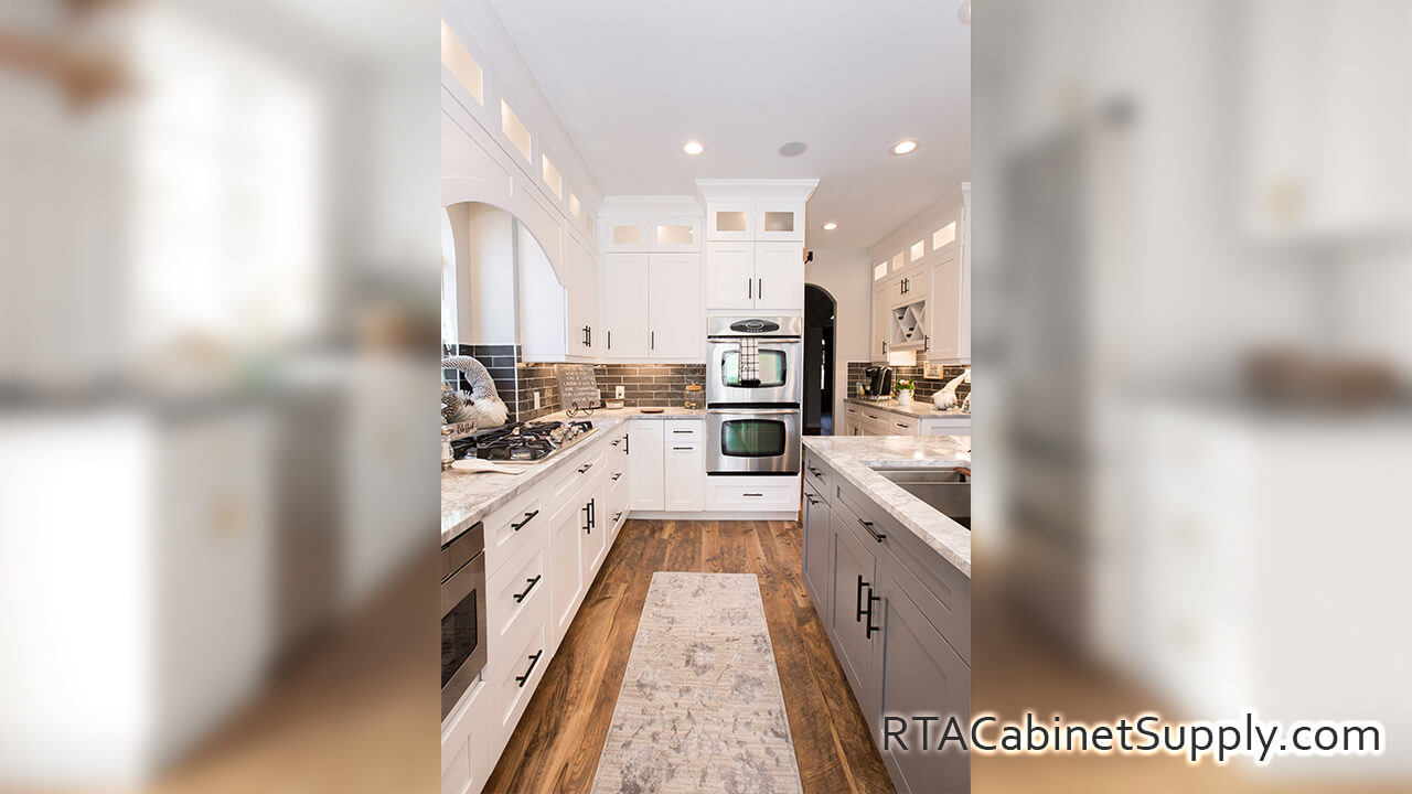 Madison White Shaker kitchen close up view with a countertop, a wine rack cabinet, wall and base cabinets.