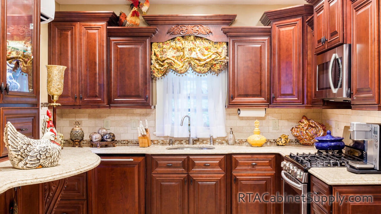 Milan Sangria kitchen full view with a countertop, wall and base cabinets.