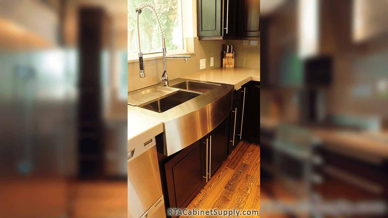 Modern Espresso kitchen angle view with a farmhouse sink cabinet, a countertop, wall and base cabinets.