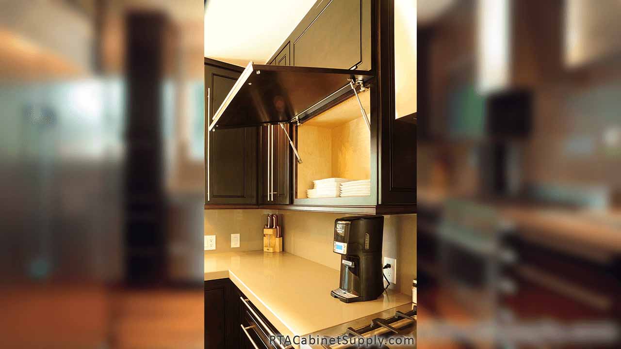 Modern Espresso kitchen angle view with a countertop, and wall cabinets.