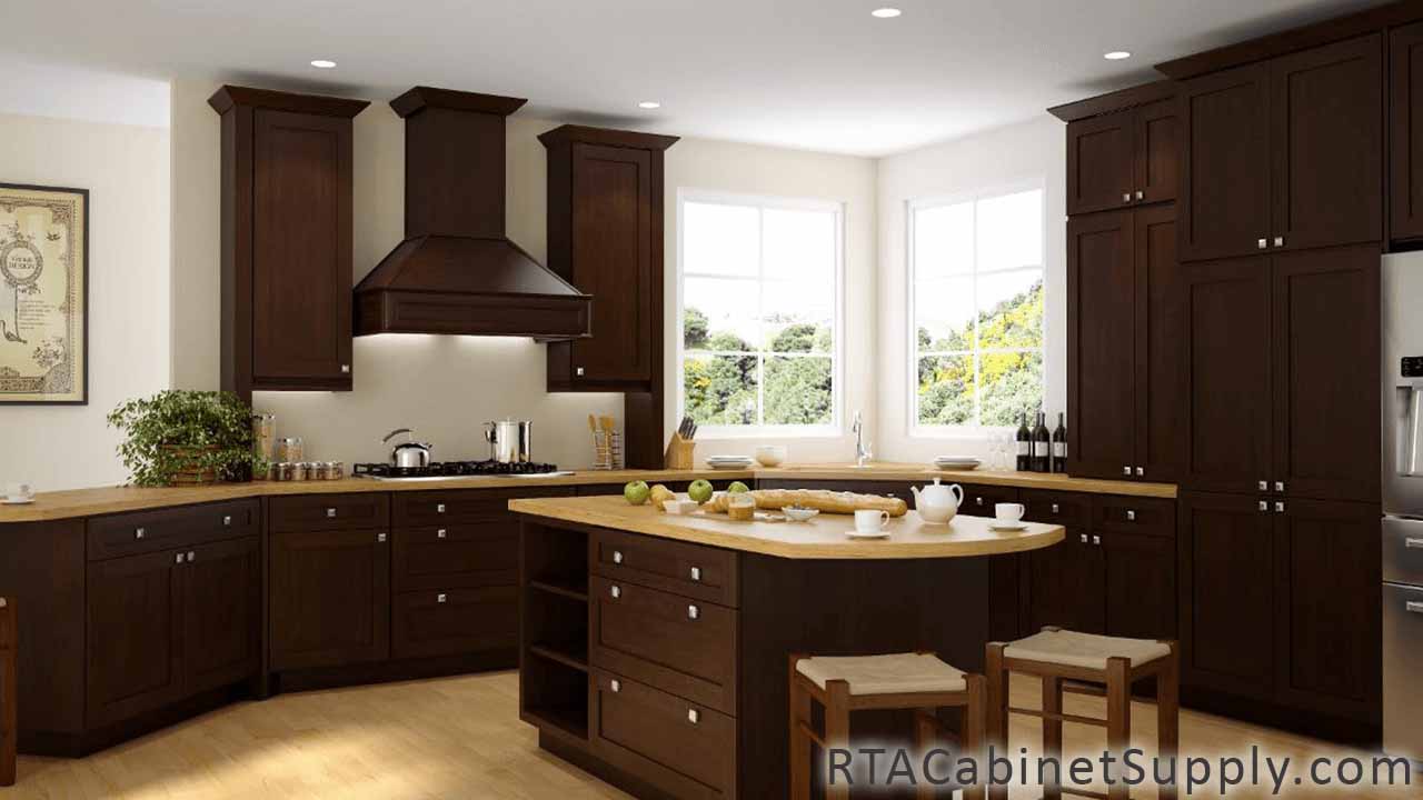 Newport Espresso Shaker kitchen full angle view with a range hood cover, an island, a countertop, pantry cabinets, wall and base cabinets.