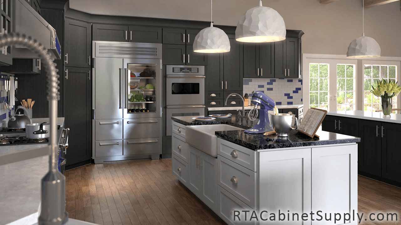 Newport Smoke Shaker kitchen close up view with an island, a countertop, lighting, a fridge, pantry cabinets, wall and base cabinets.