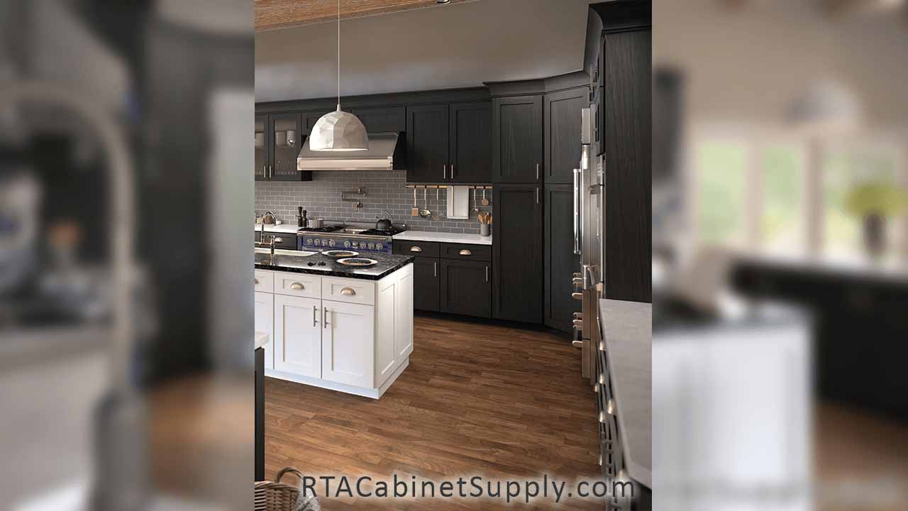 Newport Smoke Shaker kitchen close up view with a range hood, an island, a countertop, glass door cabinets, pantry cabinets, wall and base cabinets.